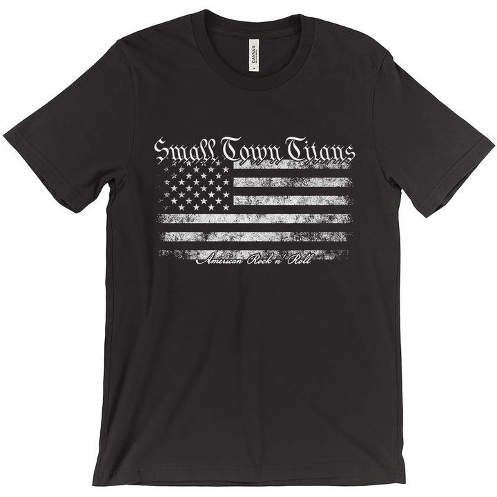 A black t-shirt with an American flag design and the text 'SMALL TOWN TITANS' on it.