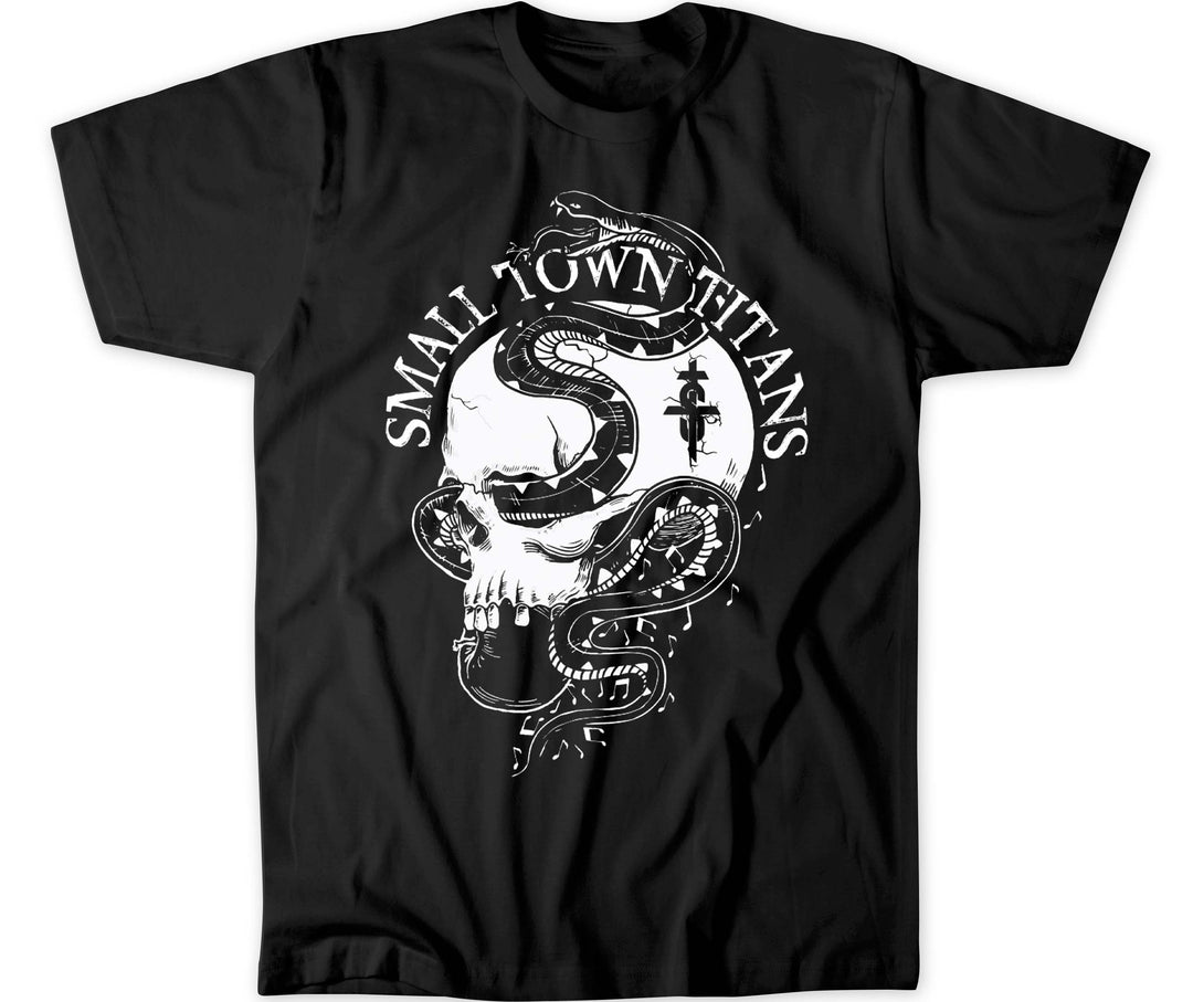 A black t-shirt with a graphic print of a snake wrapped around a skull holding an apple, and the text 'SMALL TOWN TITANS' below it.